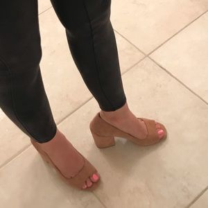 Suede block heel peep toe heel shoe.